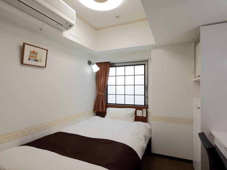 Hotel Check In Shijokarasuma Kyōto Exterior foto